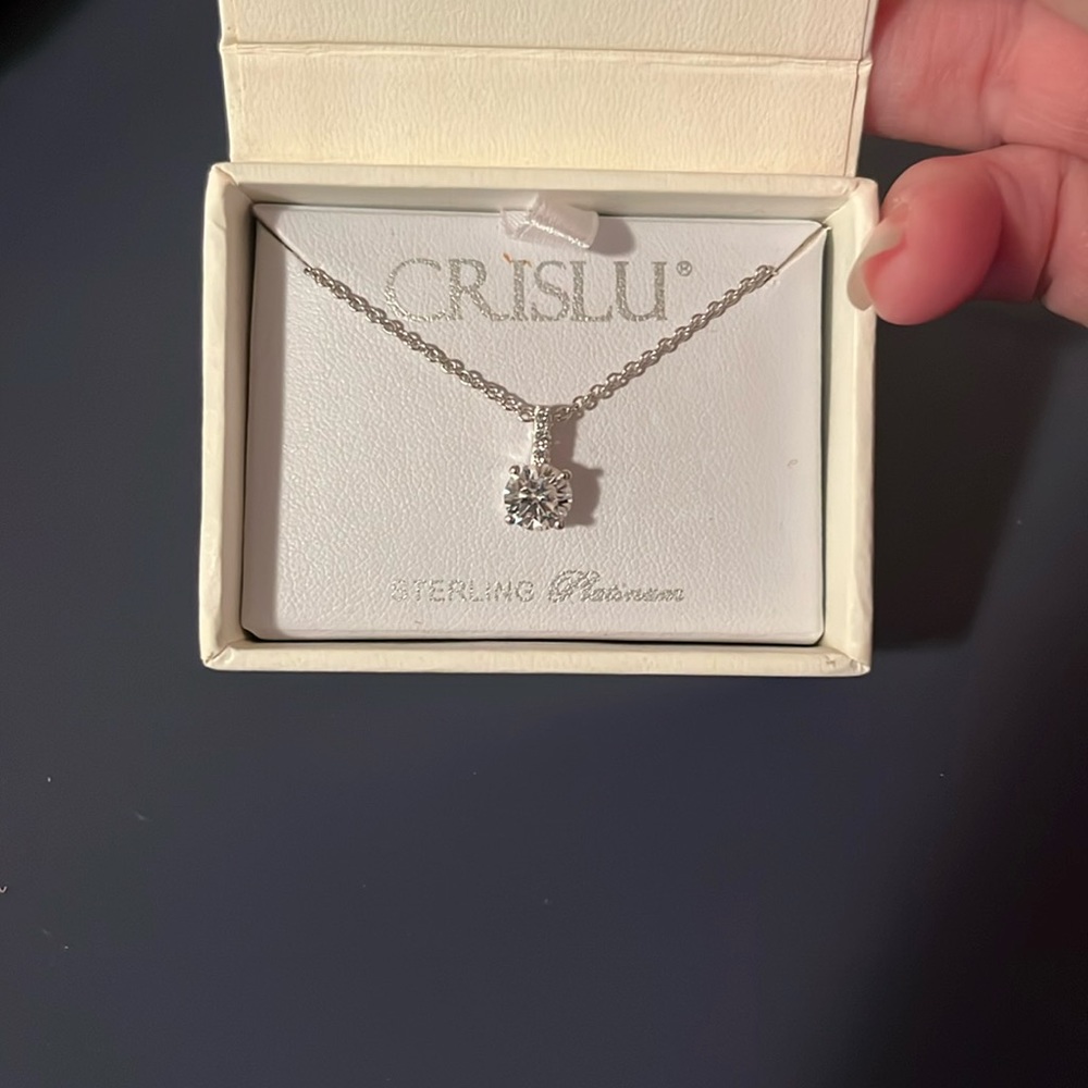 Sterling platinum necklace with cubic zirconia. In original box!